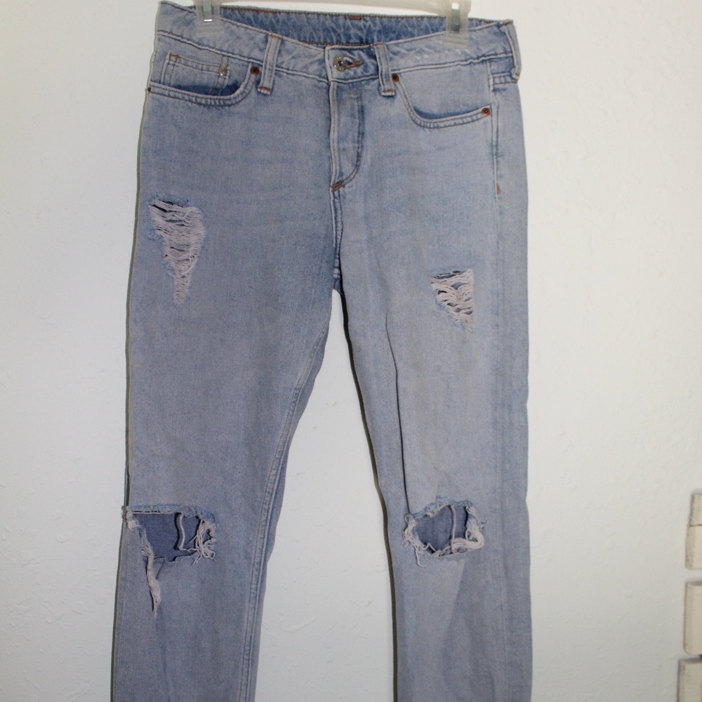 size 25 Light wash distressed boyfriend jeans